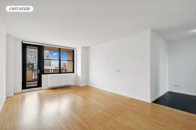 New York City Real Estate | View 301 East 87th Street, 24F | Living room and dining foyer | View 4