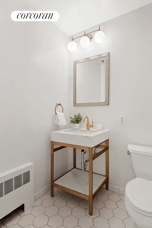 New York City Real Estate | View 143 East 34th Street, 6S | Half Bathroom | View 11