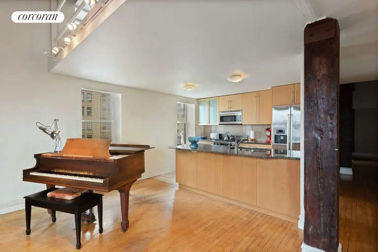 New York City Real Estate | View 35 Bethune Street, PHD | Living Room and Kitchen | View 2