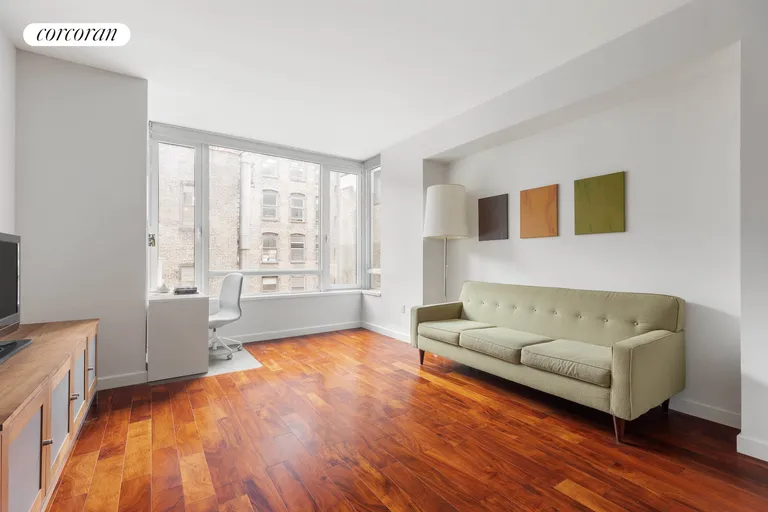 New York City Real Estate | View 261 West 28th Street, 5F | Living Room | View 2