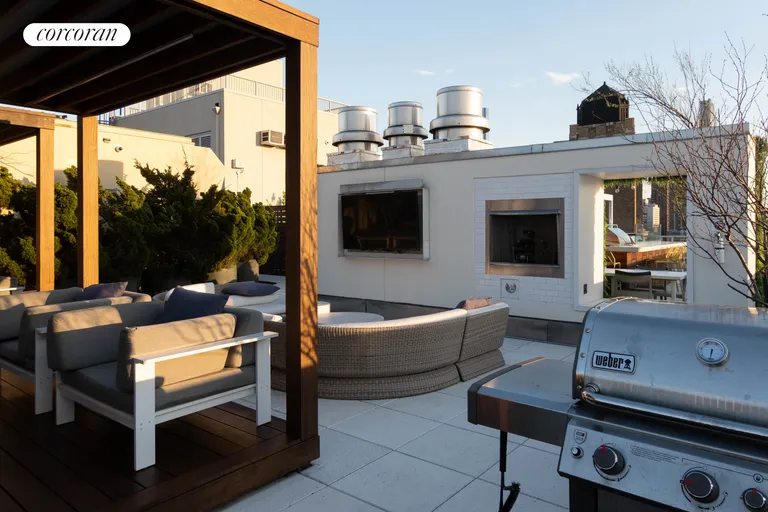 New York City Real Estate | View 227 West 77th Street, 8H | Roofdeck TV, Fireplace and Grill | View 20