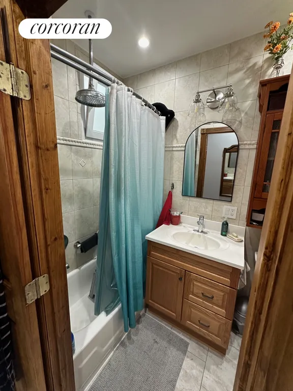 New York City Real Estate | View 75-20 61st Street | Full Bathroom | View 8