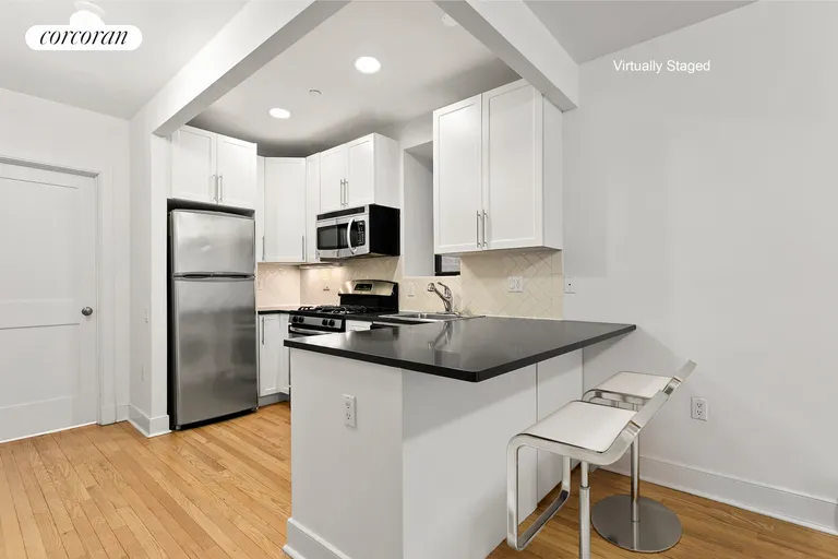 New York City Real Estate | View 305 West 150th Street, 205 | Open Windowed Kitchen w barcounter | View 3