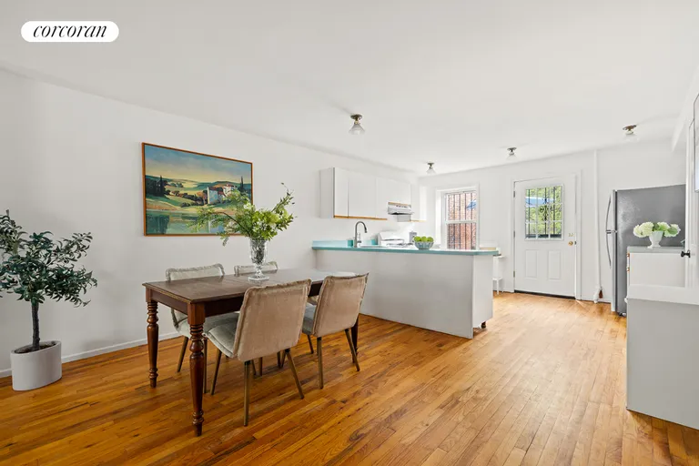 New York City Real Estate | View 425 46th Street | Garden floor dining area & kitchen | View 3