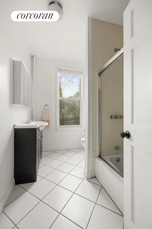 New York City Real Estate | View 425 46th Street | Full windowed bathroom | View 6