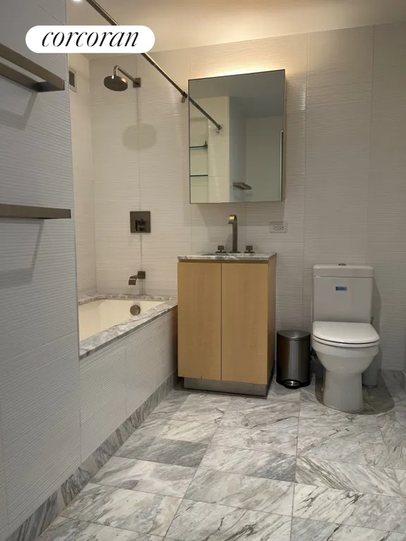 New York City Real Estate | View 322 West 57th Street, 50F | Guest Bathroom | View 7