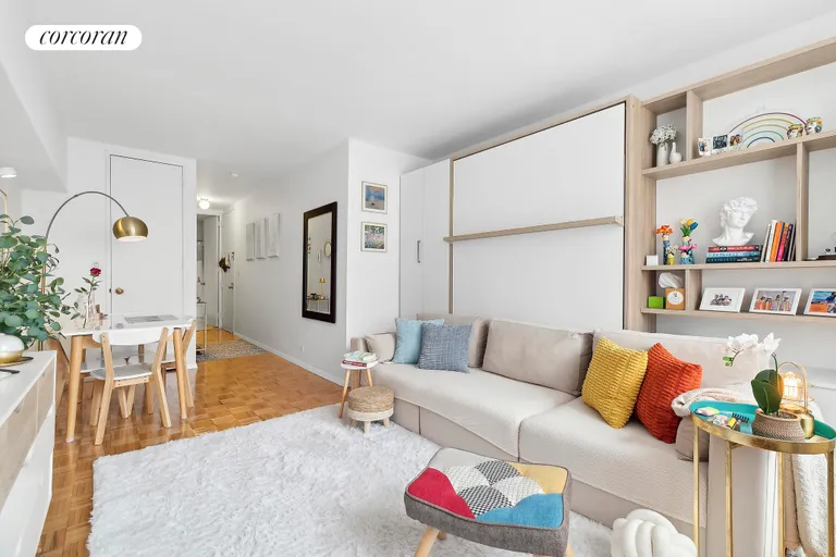 New York City Real Estate | View 393 West 49th Street, 2N | Living Room | View 2