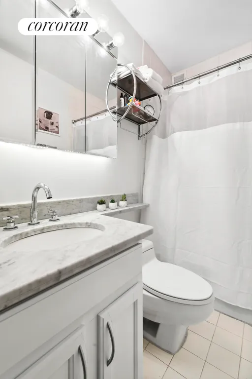 New York City Real Estate | View 393 West 49th Street, 2N | Full Bathroom | View 4
