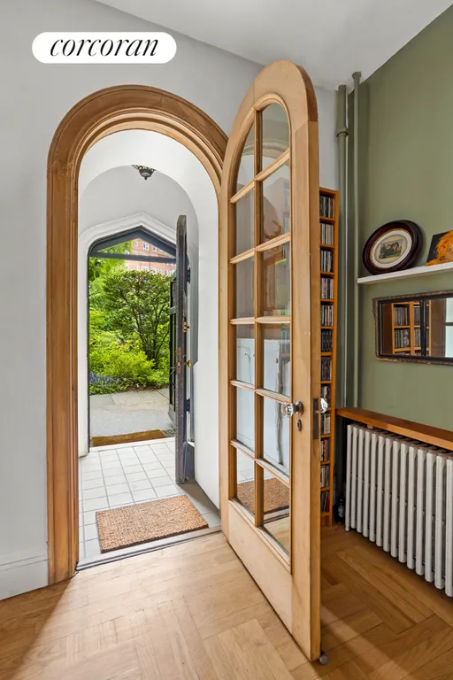 New York City Real Estate | View 116 PINEHURST AVENUE, F14 | Door to the Gardens from Primary | View 5