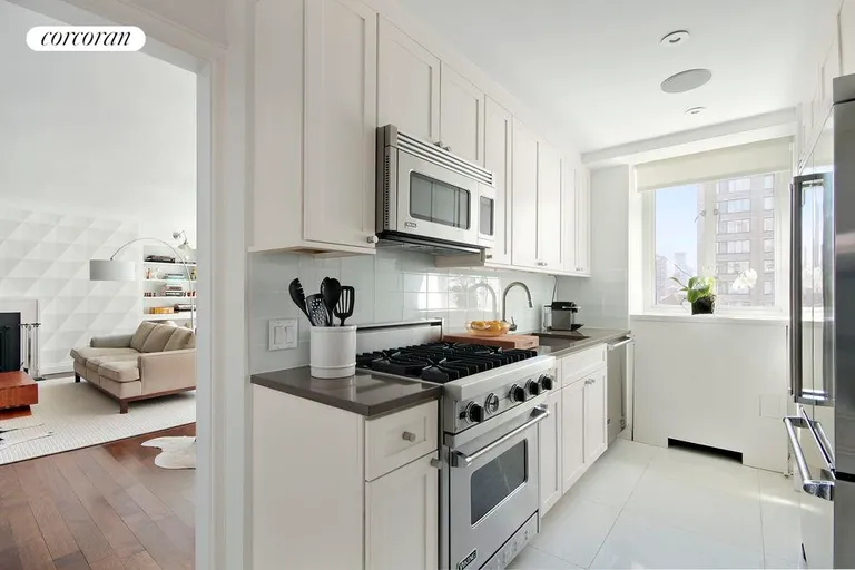 New York City Real Estate | View 200 East 66th Street, B1703 | Windowed Kitchen with Top of the Line Appliances | View 3