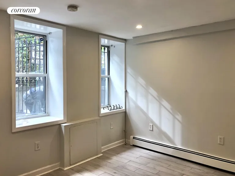 New York City Real Estate | View 85 Arlington Avenue | Garden Apartment Living Room | View 21