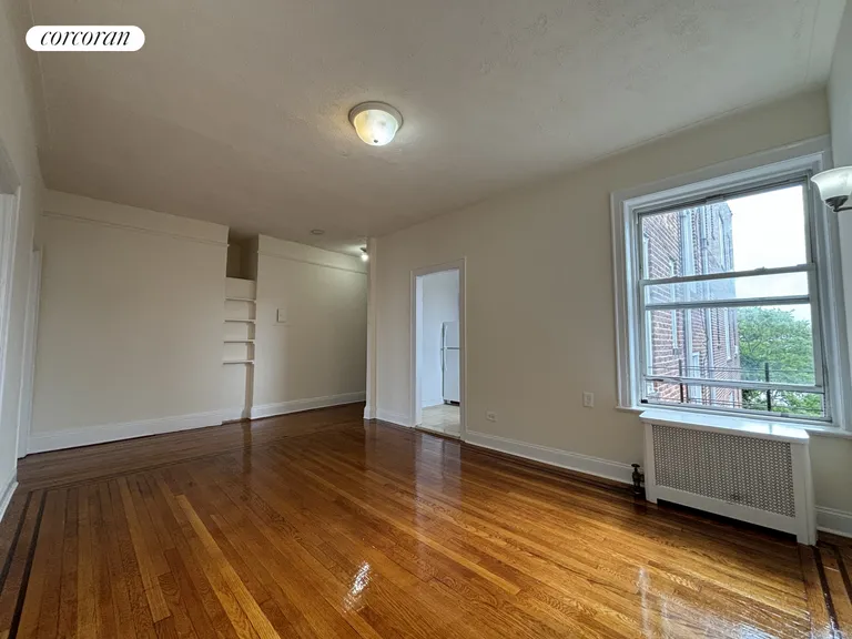 New York City Real Estate | View 43-21 56th Street, 31 | 2 Beds, 1 Bath | View 1