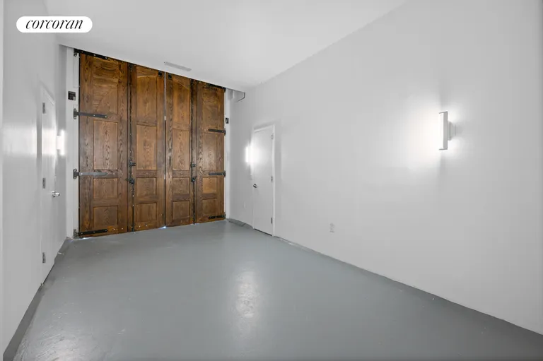 New York City Real Estate | View 23 Cornelia Street | Drive-in garage | View 18