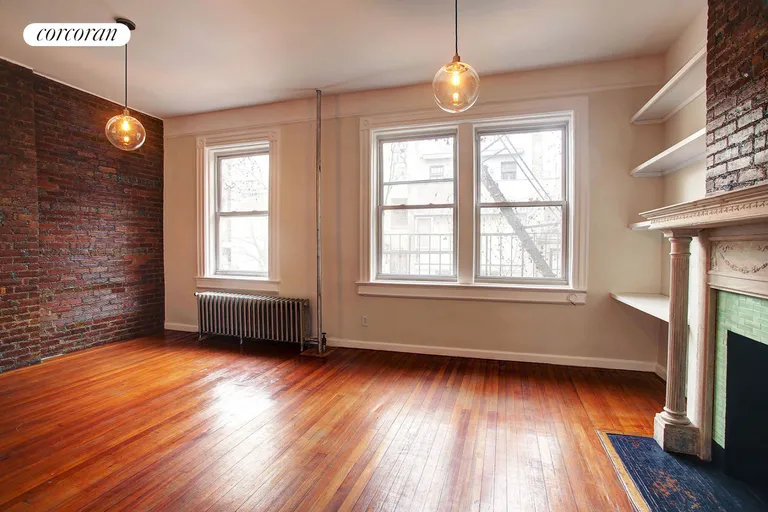 New York City Real Estate | View 83 Washington Place, 3R | Living Room | View 2