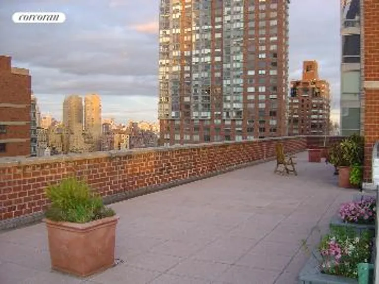 New York City Real Estate | View 130 West 67th Street, 8C | relax on the rooftop garden | View 5
