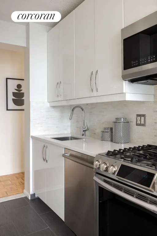 New York City Real Estate | View 4-74 48th Avenue, 38K | Modern Kitchen w/SS Appliances | View 7