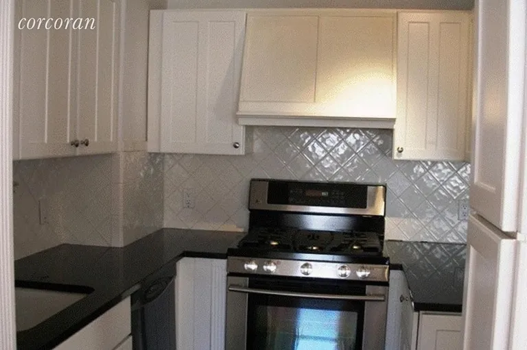 New York City Real Estate | View 77 East 12th Street, 16EF | Corner Inside Kitchen | View 4