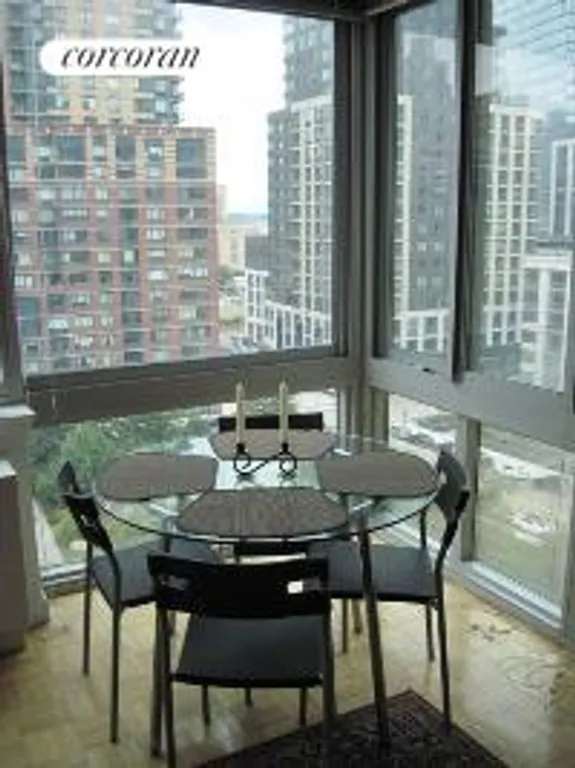 New York City Real Estate | View 101 WEST END AVENUE, 9N | Breakfast area with river views | View 3