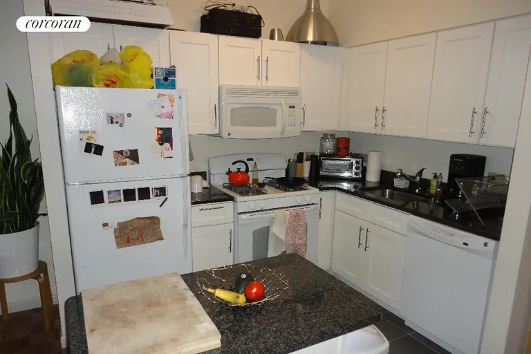 New York City Real Estate | View 218 Myrtle Avenue, 2H | Perfect cooking layout & storage  w/island counter | View 4