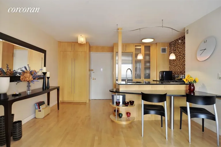 New York City Real Estate | View 301 East 79th Street, 23E | Absoultely Stunning Kitchen  granite breakfast bar | View 2