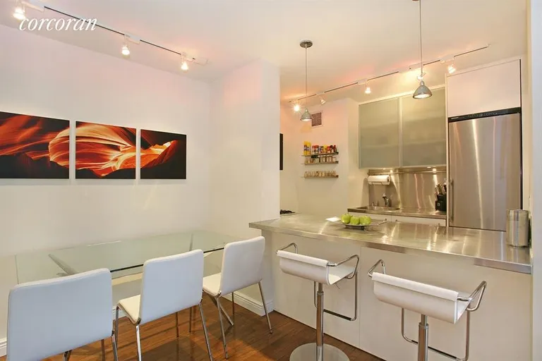 New York City Real Estate | View 1725 York Avenue, 6H | Gorgeous modern open kitchen | View 3