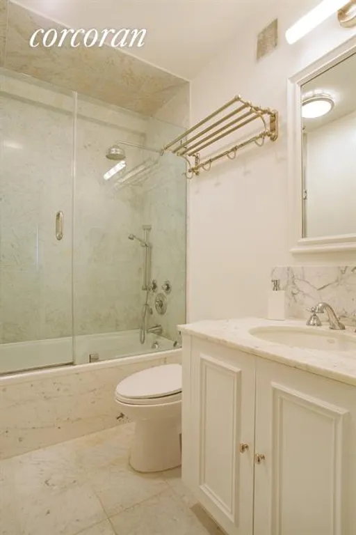 New York City Real Estate | View 1725 York Avenue, 6H | Marble Master Bathroom | View 6