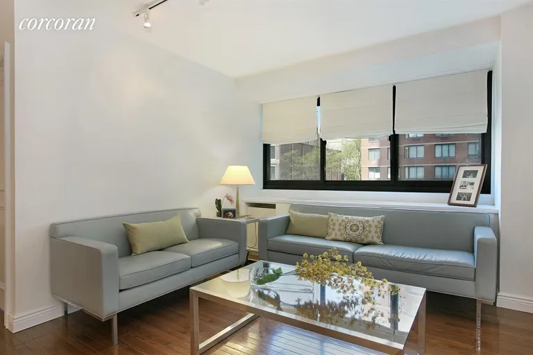 New York City Real Estate | View 1725 York Avenue, 6H | Bright and quiet living room | View 2