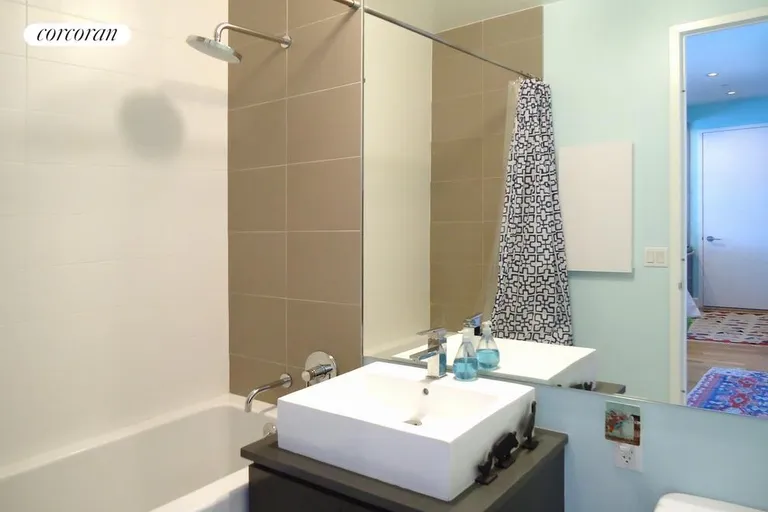 New York City Real Estate | View 315 Gates Avenue, 2P | Full bathroom with a soaking tub | View 5