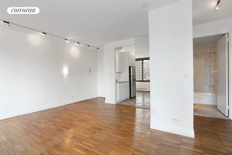 New York City Real Estate | View 300 East 85th Street, 1003 | Living Room / Dressing Area | View 4