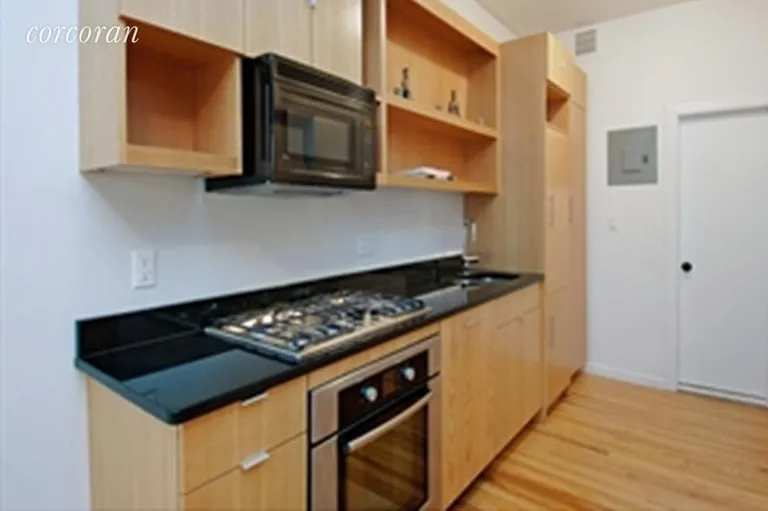 New York City Real Estate | View 421 West 22nd Street, 4R | Newly Renovated Kitchen with Lots of Storage | View 2