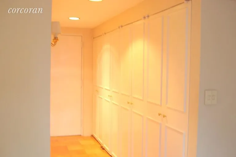 New York City Real Estate | View 111 East 88th Street, 10F | Foyer with a Row of Spacious Closets. | View 2