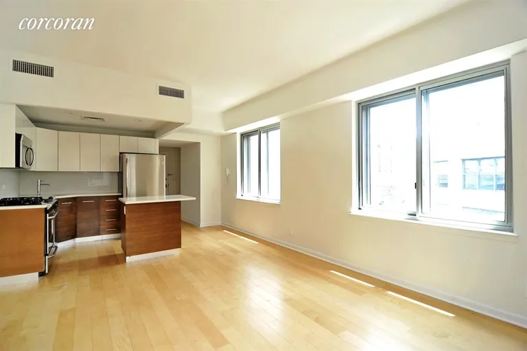 New York City Real Estate | View 133 Water Street, 11D | Living & dining area with open kitchen | View 2