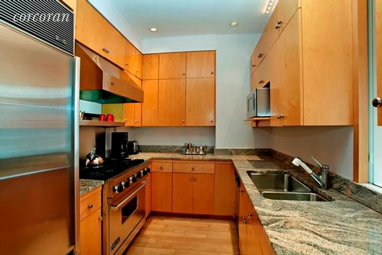 New York City Real Estate | View 27 North Moore Street, PHB | Gourmet Kitchen featuring top appliances | View 2