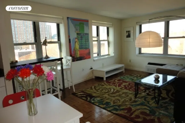 New York City Real Estate | View 218 Myrtle Avenue, 7A | Cheer and light fills the room with Pop Art | View 2