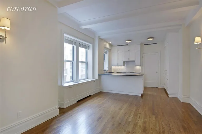 New York City Real Estate | View 215 West 88th Street, 8H | Dining Room/Den shares sun-drenched open kitchen | View 2