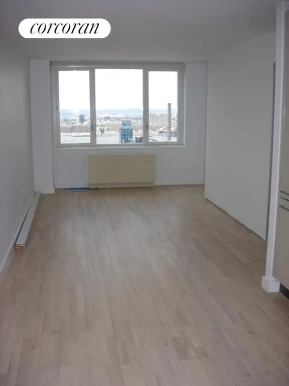New York City Real Estate | View 322 West 57th Street, 53U | Nordic ash floors & central A/C | View 4
