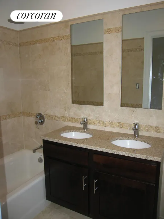 New York City Real Estate | View 243 West 98th Street, 7B | Master Bath with double vanity and tub | View 5