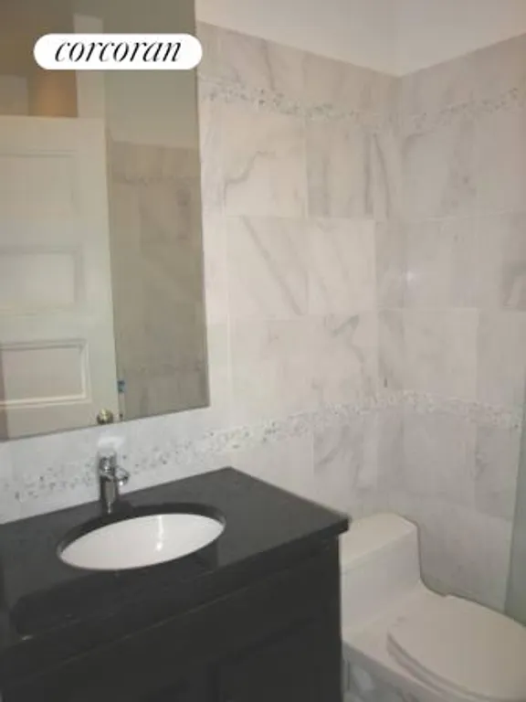 New York City Real Estate | View 243 West 98th Street, 7B | Bathroom 2 marble clad with shower. | View 6