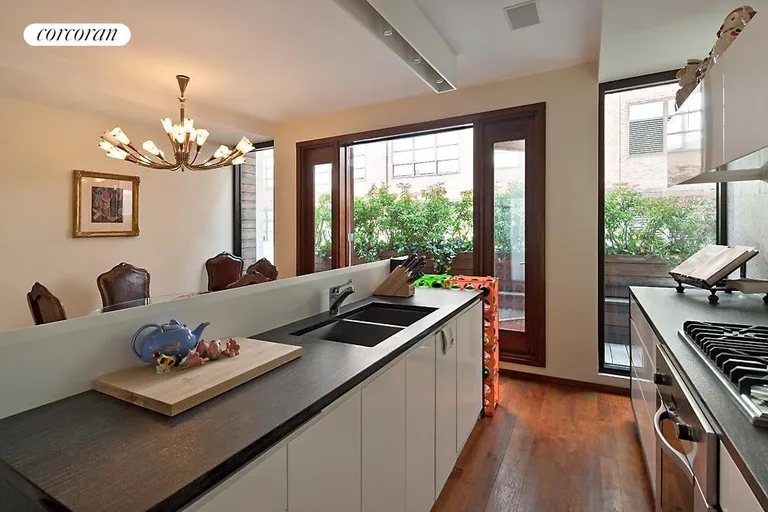 New York City Real Estate | View 342 West 15th Street, PH | Kitchen/Dining Room/Terrace | View 5