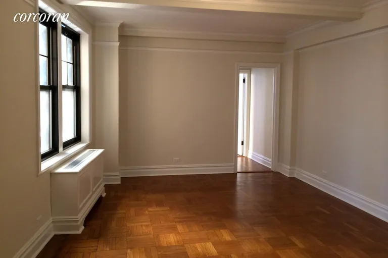 New York City Real Estate | View 172 West 79th Street, 9E | Spacious living room with beamed ceilings. | View 2