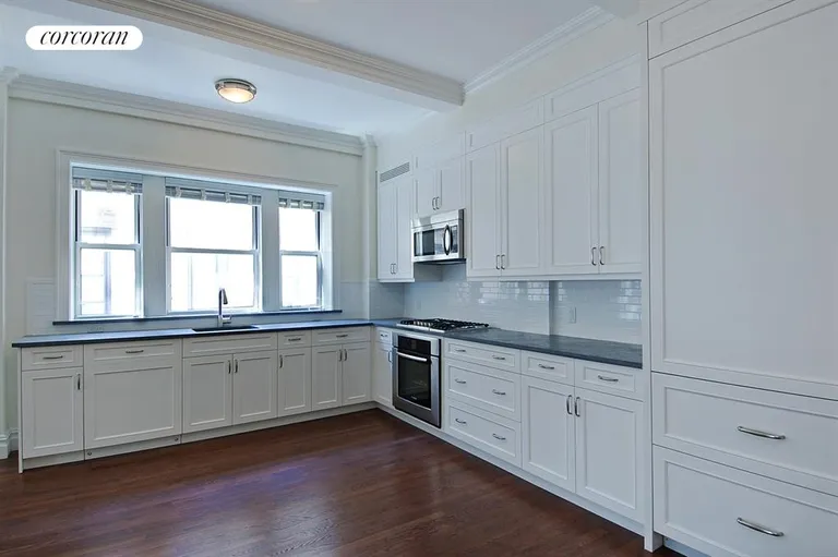 New York City Real Estate | View 215 West 88th Street, 12D | Open windowed kitchen has SubZero & Bosch stove | View 3