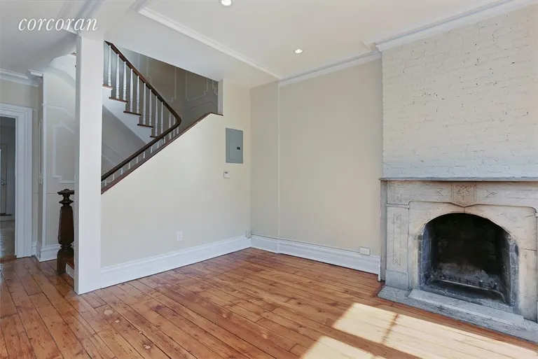 New York City Real Estate | View 137 Washington Avenue, 2 | Living Room with working woodburning foreplace | View 2