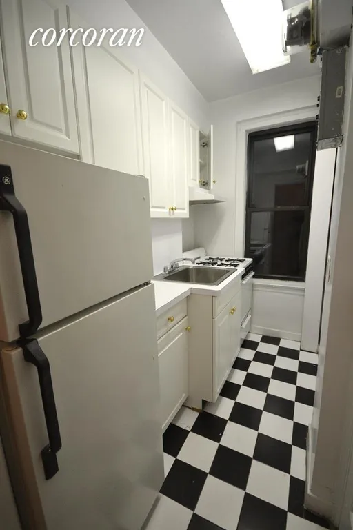 New York City Real Estate | View 201 West 77th Street, 2H | Kitchen with full size appliances | View 3
