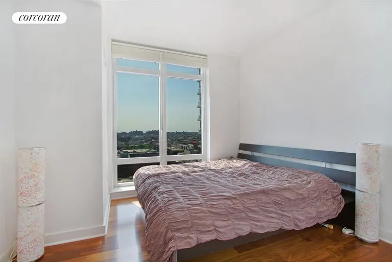 New York City Real Estate | View 2 Northside Piers, 17G | East facing window in the bedroom | View 3