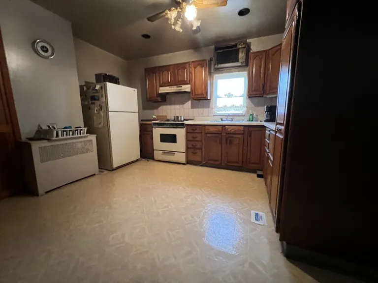 New York City Real Estate | View 1363 61st Street, TOWNHOUSE | Kitchen (RPX) | View 3