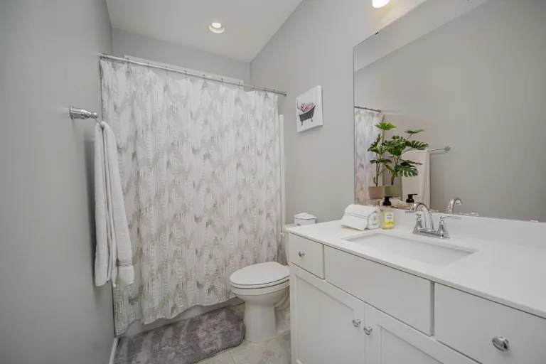 New York City Real Estate | View 3424 Saint Clair Court NW | guest bath | View 9