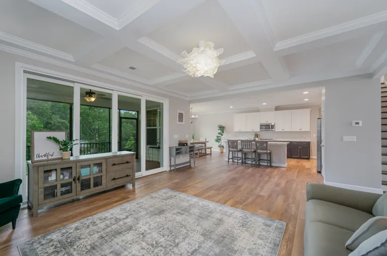 New York City Real Estate | View 3424 Saint Clair Court NW | family room to kitchen | View 13