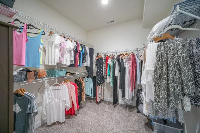 New York City Real Estate | View 3424 Saint Clair Court NW | primary closet | View 28