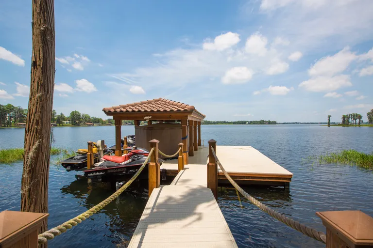 New York City Real Estate | View 11205 BRIDGE HOUSE RD | 042_Boat dock with jet ski lifts | View 39