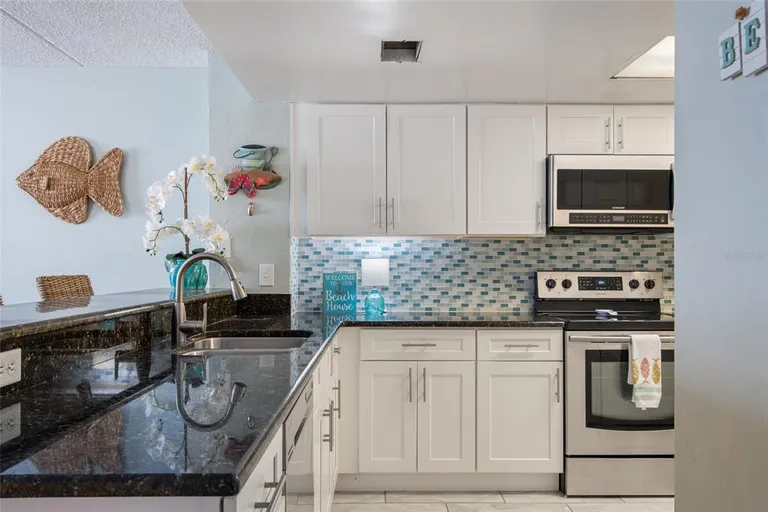 Central Florida Real Estate | View 6727 Turtlemound Road Unit# 417 | room 11 | View 12